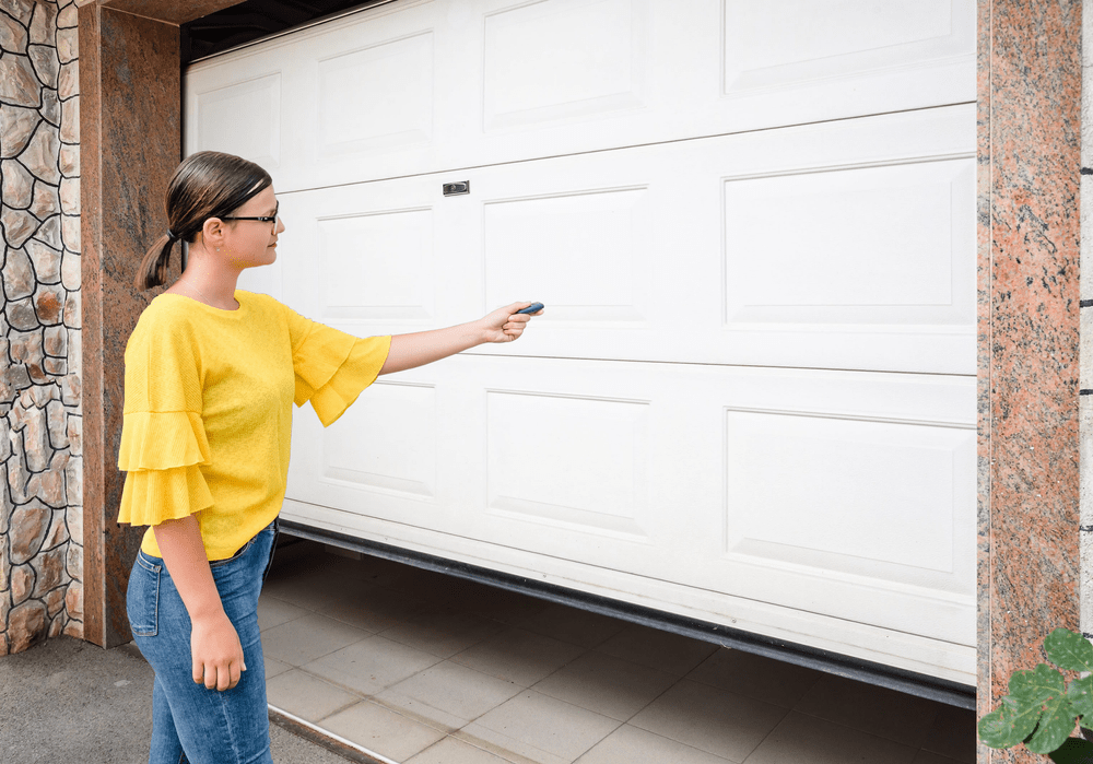 How to Program Your Garage Door Opener - garage door installation conroe